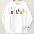 Grandma's Garden Back View Kid Sitting Birth Month Flower Personalized Sleeve Printed Sweatshirt